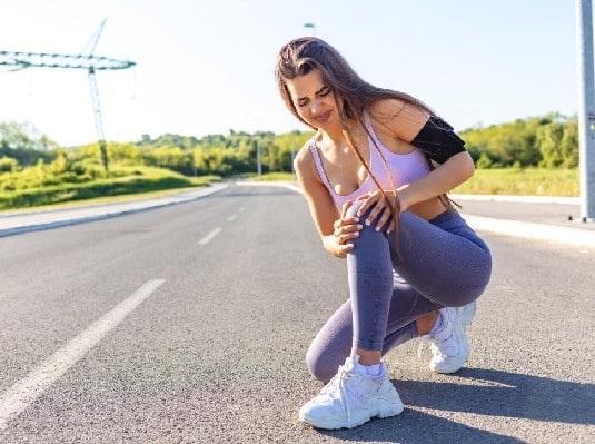 Pijn buitenkant knie met sporten